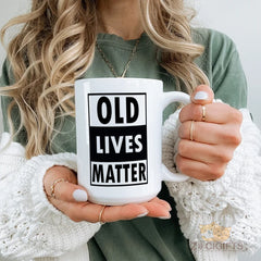 Vintage Black "Old Lives Matter" Quote Mug | Funny Retro Typography Drinkware for Coffee, Tea | Unique Gift for Hippie, Punk, Classic Rock Fans | Durable Ceramic Cup with C-Handle
